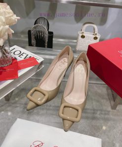 This Viv 'Choc Lacquer Buckle High Heel is handmade in shiny patent leather, embellished wit60q0am78