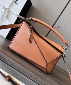 Loewe Bags Loewe's New Embossed Logo Small Puzzle Handbag Has ArrivedLOEWE's Debut Handbag Features A Rect bk8phpfo